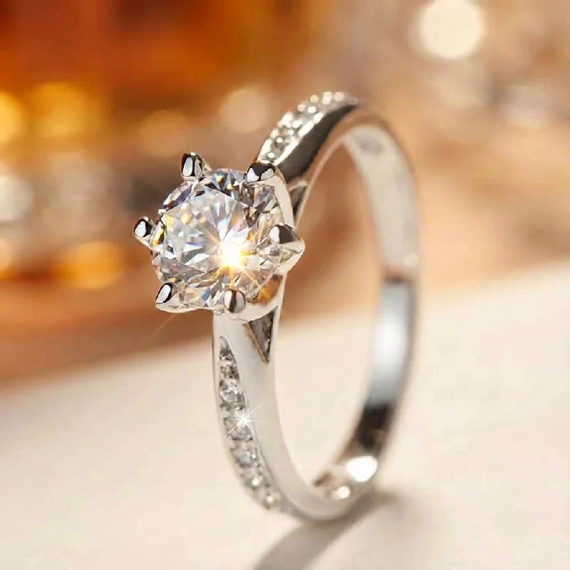 sic Six-Claw Silver Solitaire